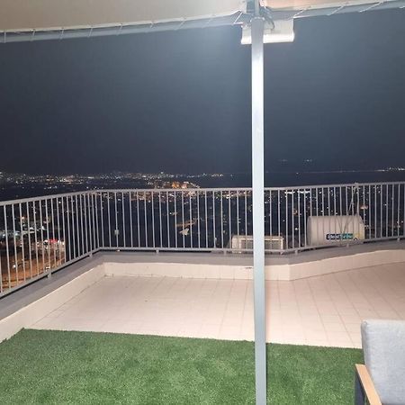 דירת זוּגַג מפנקת עם מרפסת משגעת ונוף למפרץ. Apartamento Eilat Exterior foto